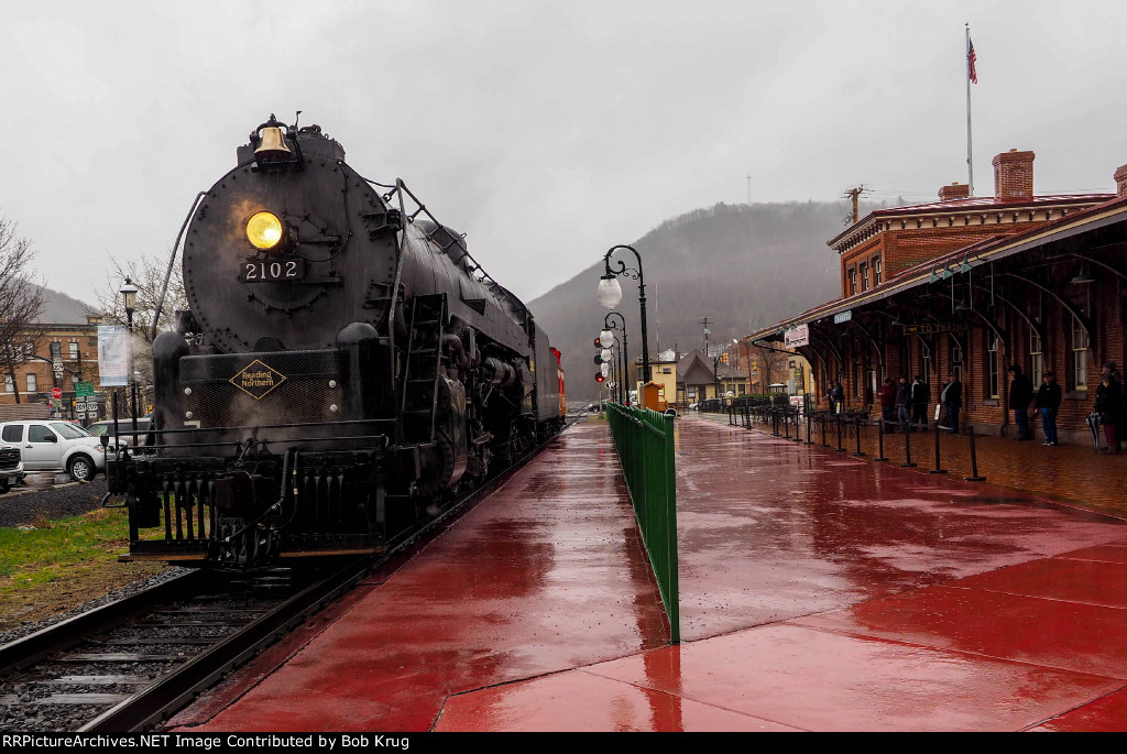 RDG 2102 Caboose hop paused at Tamaqua depot